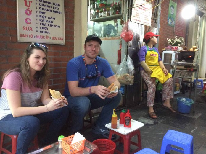 eating street food: banh my